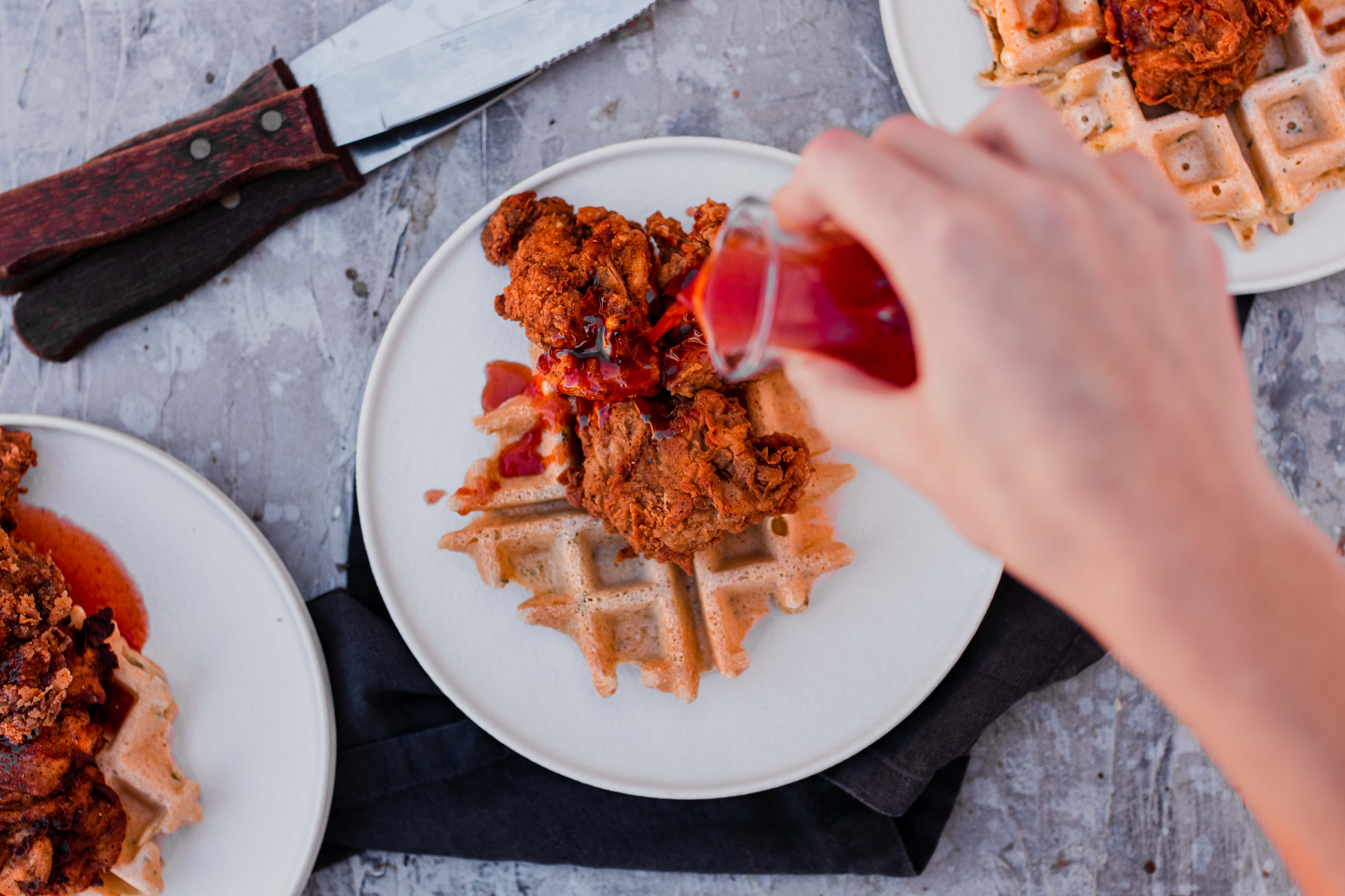 overhead of vegan chicken and waffles