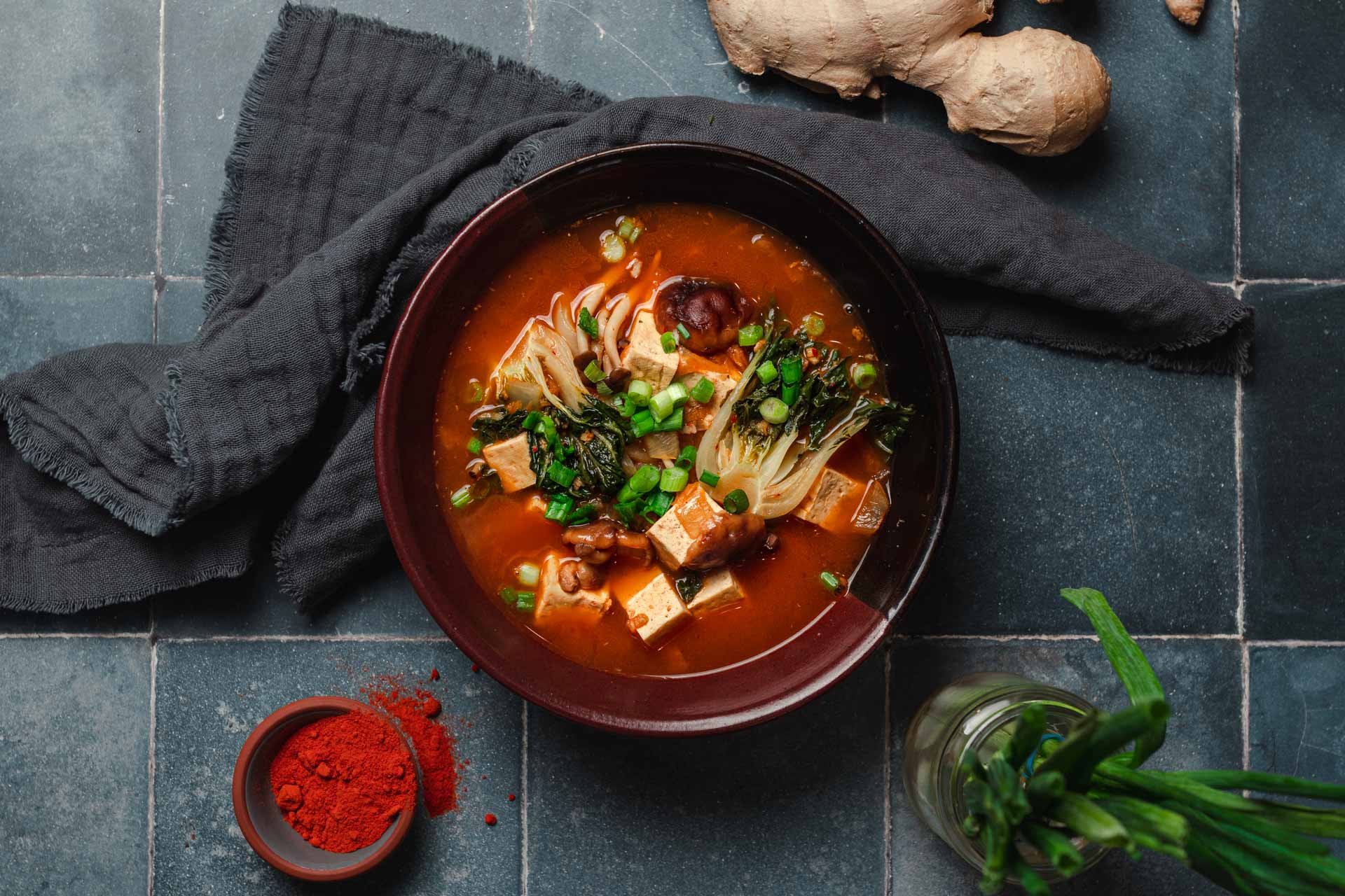 Vegan Kimchi Soup with Tofu, Mushrooms, & Bok Choy | Two Market Girls