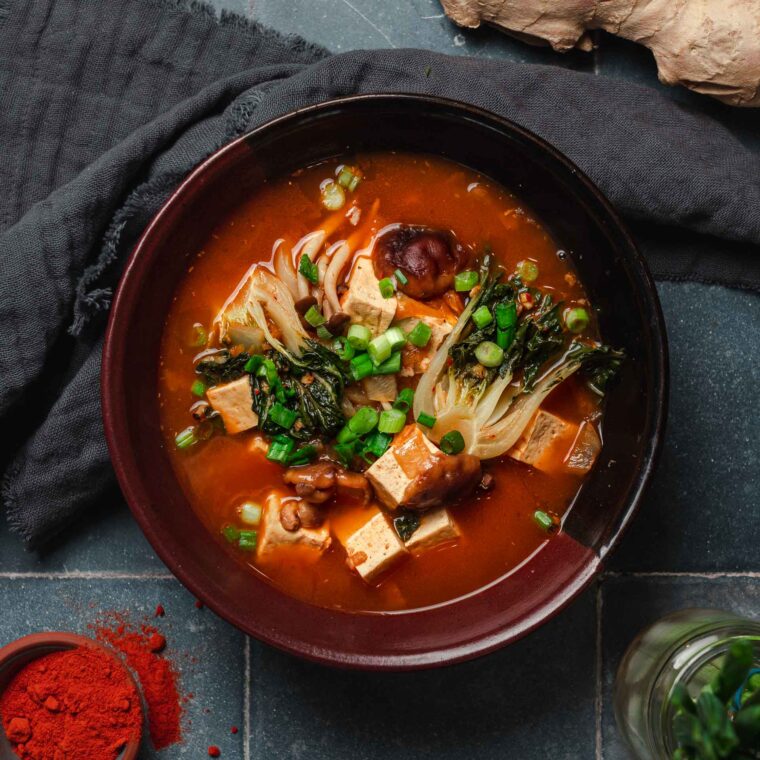 Vegan Kimchi Soup with Tofu, Mushrooms, & Bok Choy | Two Market Girls