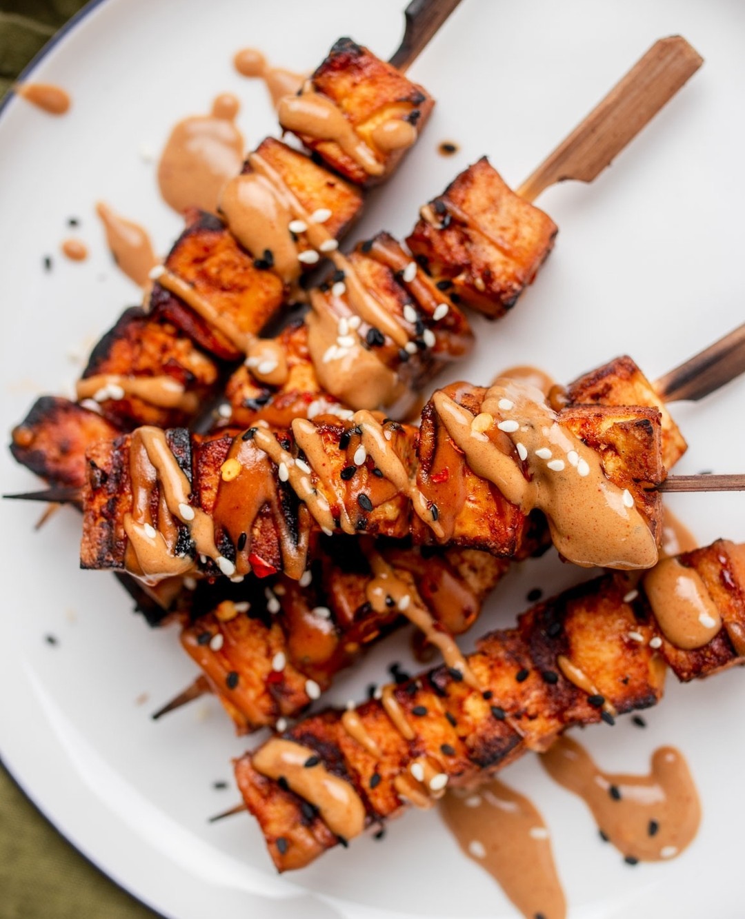 A quick and easy grill recipe that you can make in no time! Crispy Spicy Peanut Tofu Skewers, perfect for your long weekend grill party.⁠
⁠
Get the full recipe at LINK IN BIO 👆️ or at www.twomarketgirls.com⁠
⁠